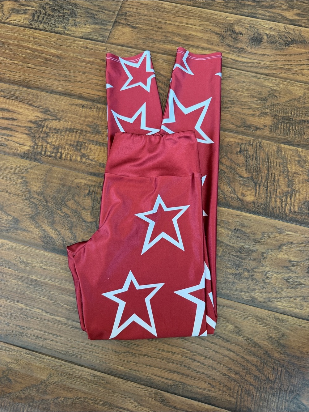 Stretch legging with stars. Fabric has a sheen